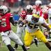 Ohio State quarterback Braxton Miller evades Michigan defensive tackle Jibreel Black in the first half on Saturday. Daniel Brenner I AnnArbor.com